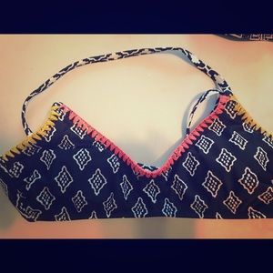 Various swimsuits bottoms and tops.